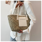 Large ivory white hand woven straw summer bag with two sturdy handles