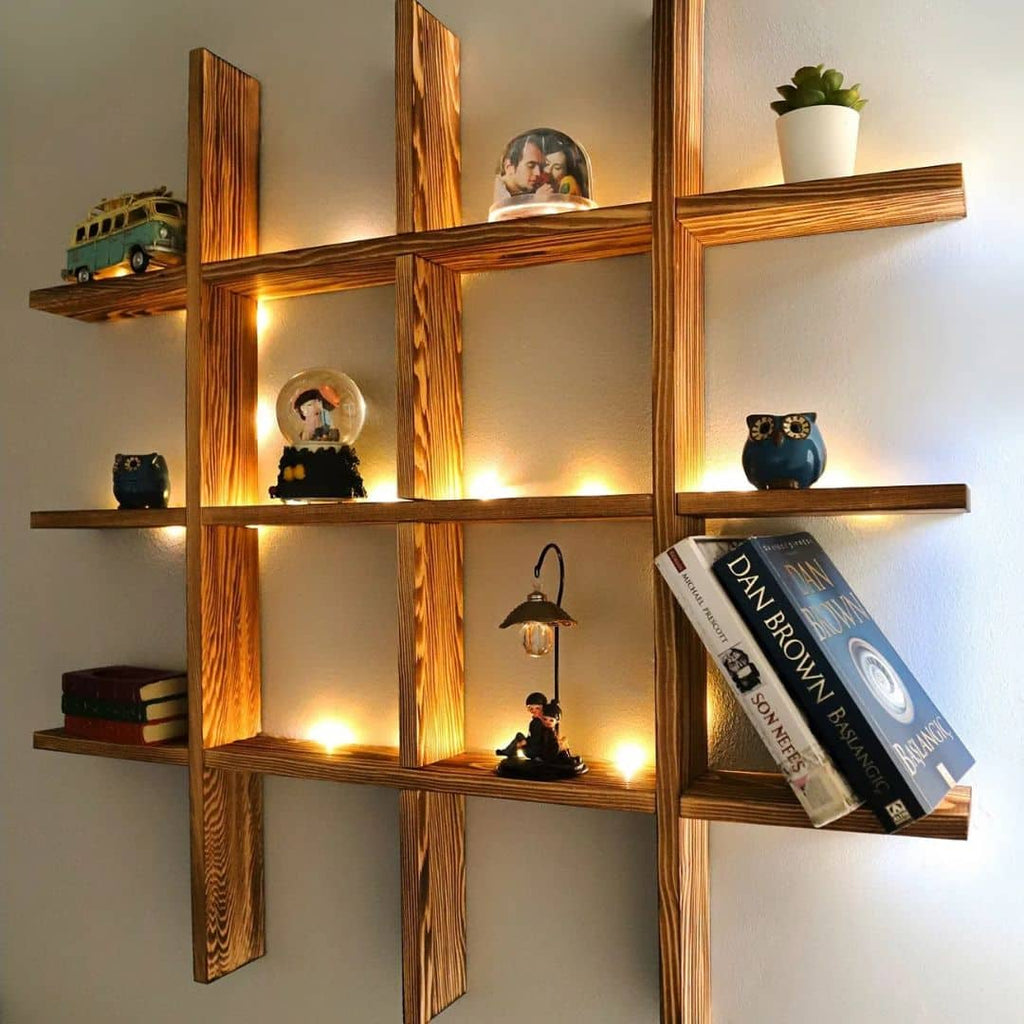 Large wooden grid wall shelf displaying books and collectibles