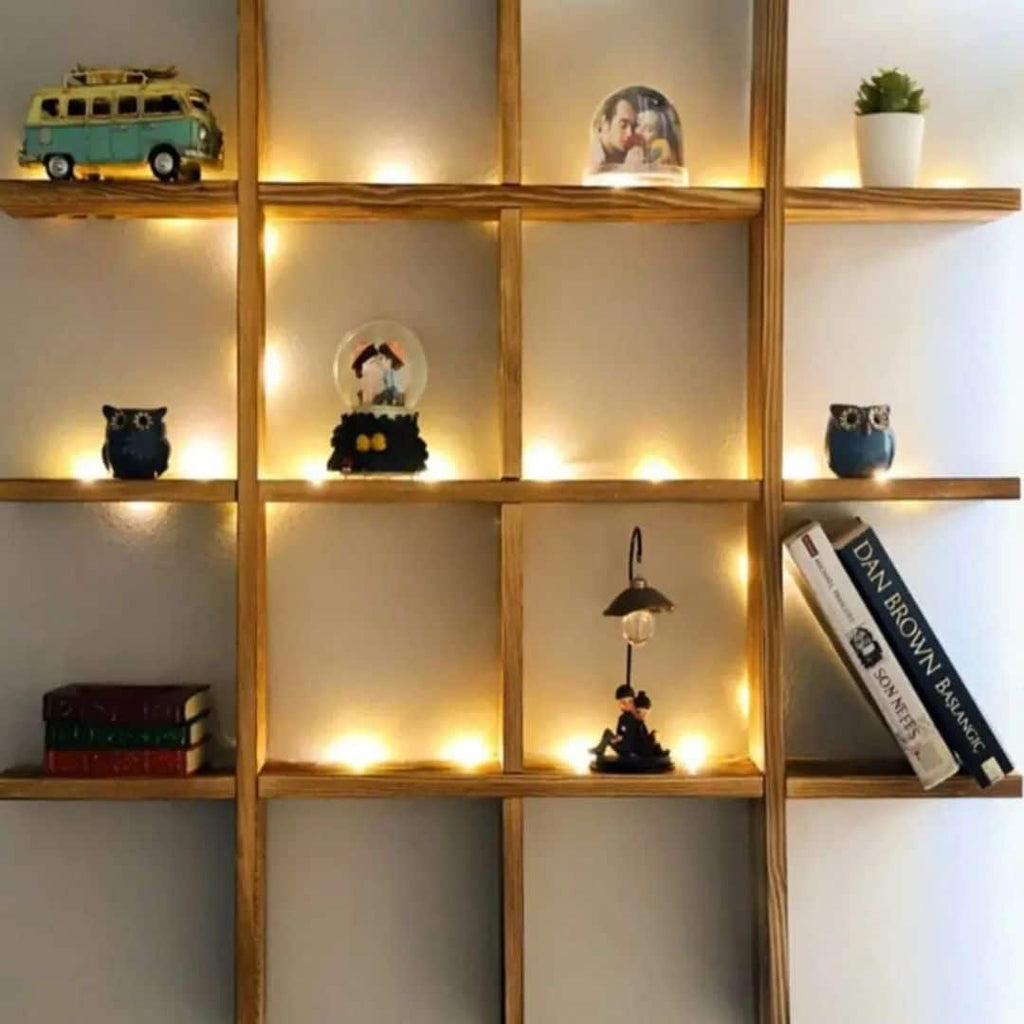 Large wooden grid wall shelf displaying books and collectibles