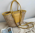 Large sunny yellow hand woven straw summer bag with two sturdy handles