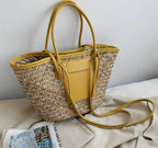 Large sunny yellow hand woven straw summer bag with two sturdy handles