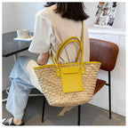 Large sunny yellow hand woven straw summer bag with two sturdy handles