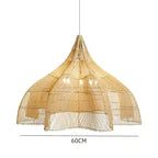 Large layered openwork rattan dome chandelier under a wooden roof