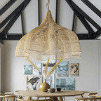 Large layered openwork rattan dome chandelier under a wooden roof
