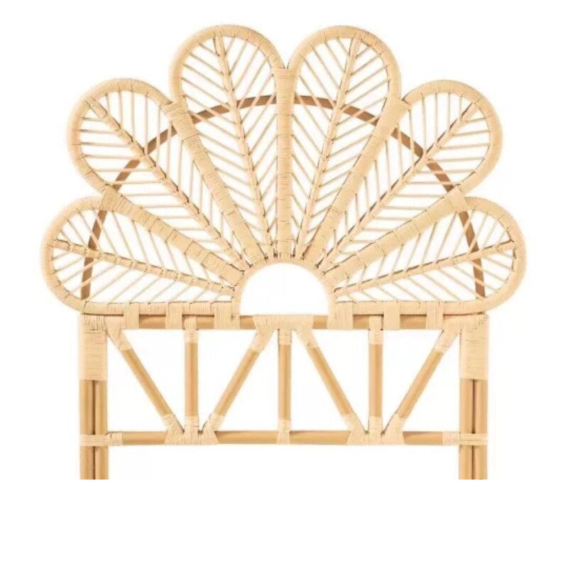 Leaf shaped headboard with six woven leaves hand woven in light rattan