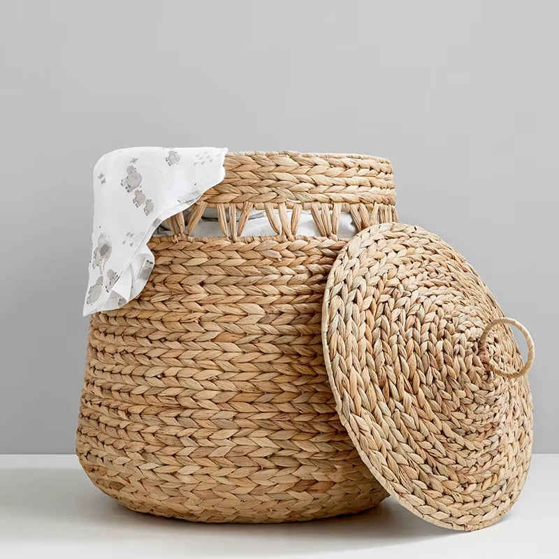 Large rounded woven rattan laundry basket with lid and knob