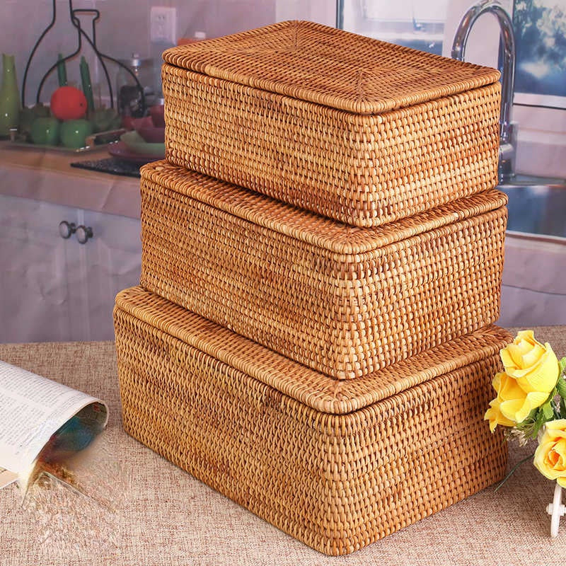 Hand woven natural rattan toy box with a fitted woven lid