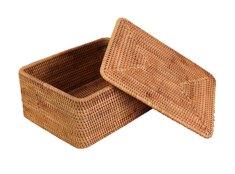 Hand woven natural rattan toy box with a fitted woven lid