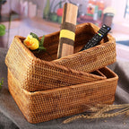 Hand woven natural rattan toy box with a fitted woven lid