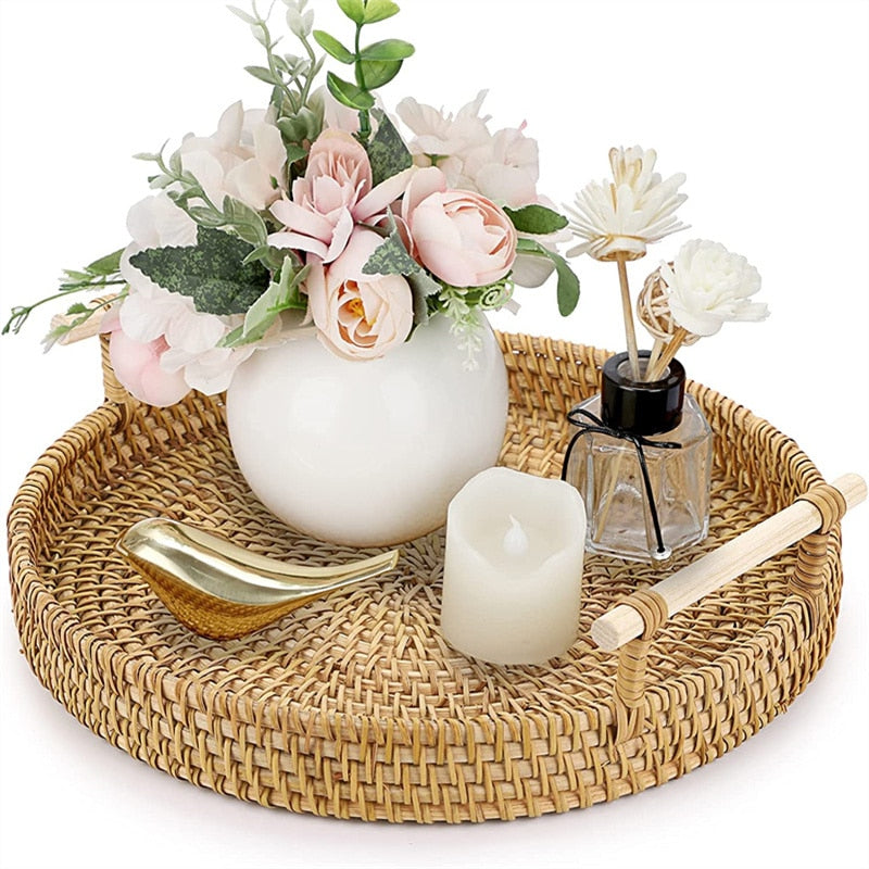 Round light beige rattan tray with wooden dowel handles