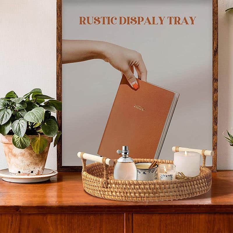 Round light beige rattan tray with wooden dowel handles