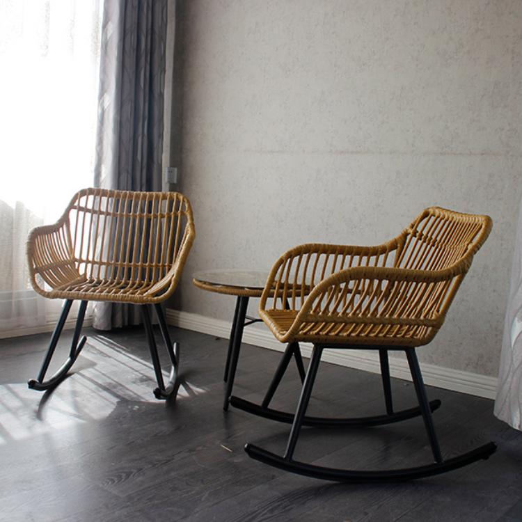 Light honey toned rocking chair hand woven in natural rattan