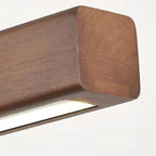 Slim linear chandelier in brown wood with an integrated LED strip