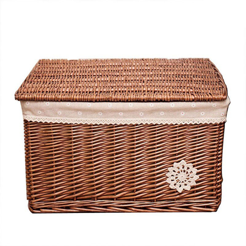 Small woven rattan toy box with a fabric lining and lace trim