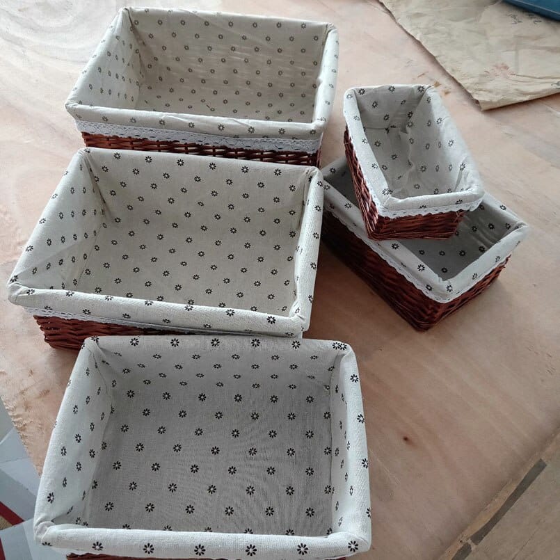 Dark rectangular wicker basket with printed fabric liner