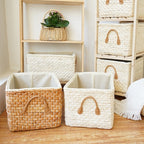 Lined woven storage boxes with handles on shelves