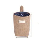 Small linen fabric storage baskets with hanging loops