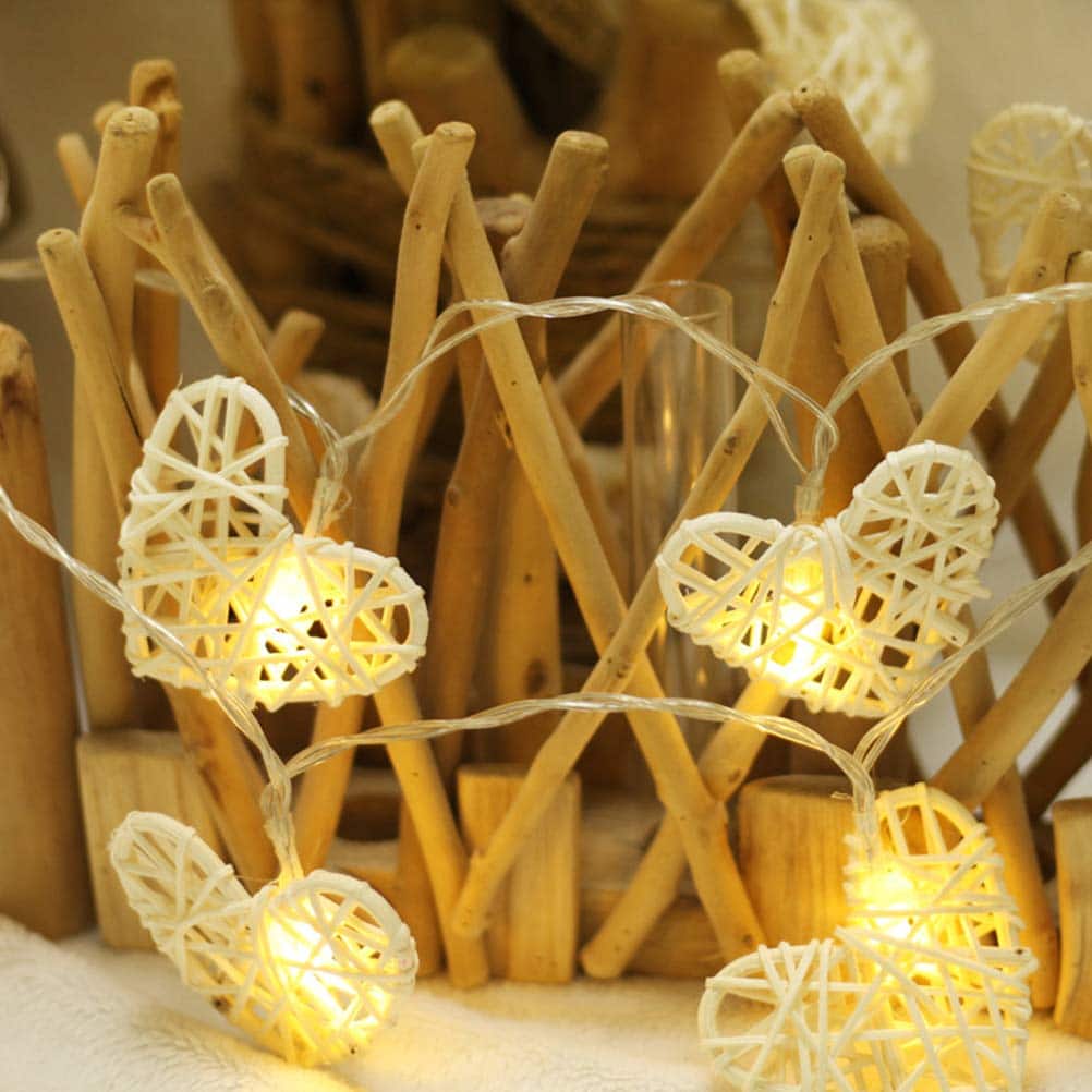 Set of a linen pennant banner and a string of woven rattan heart lights