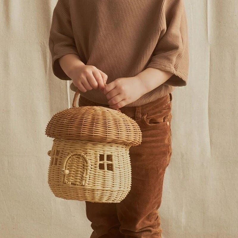 Rattan storage basket shaped like a little house with domed lid