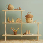 Rattan storage basket shaped like a little house with domed lid