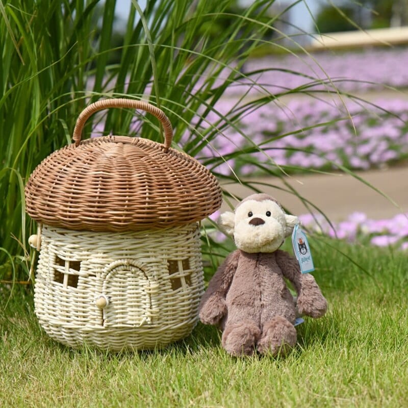 Rattan storage basket shaped like a little house with domed lid