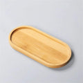 Slim long oval bamboo tray with raised edges