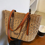 Structured luxe handbag densely hand woven in straw in beige or brown