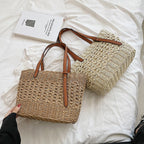 Structured luxe handbag densely hand woven in straw in beige or brown
