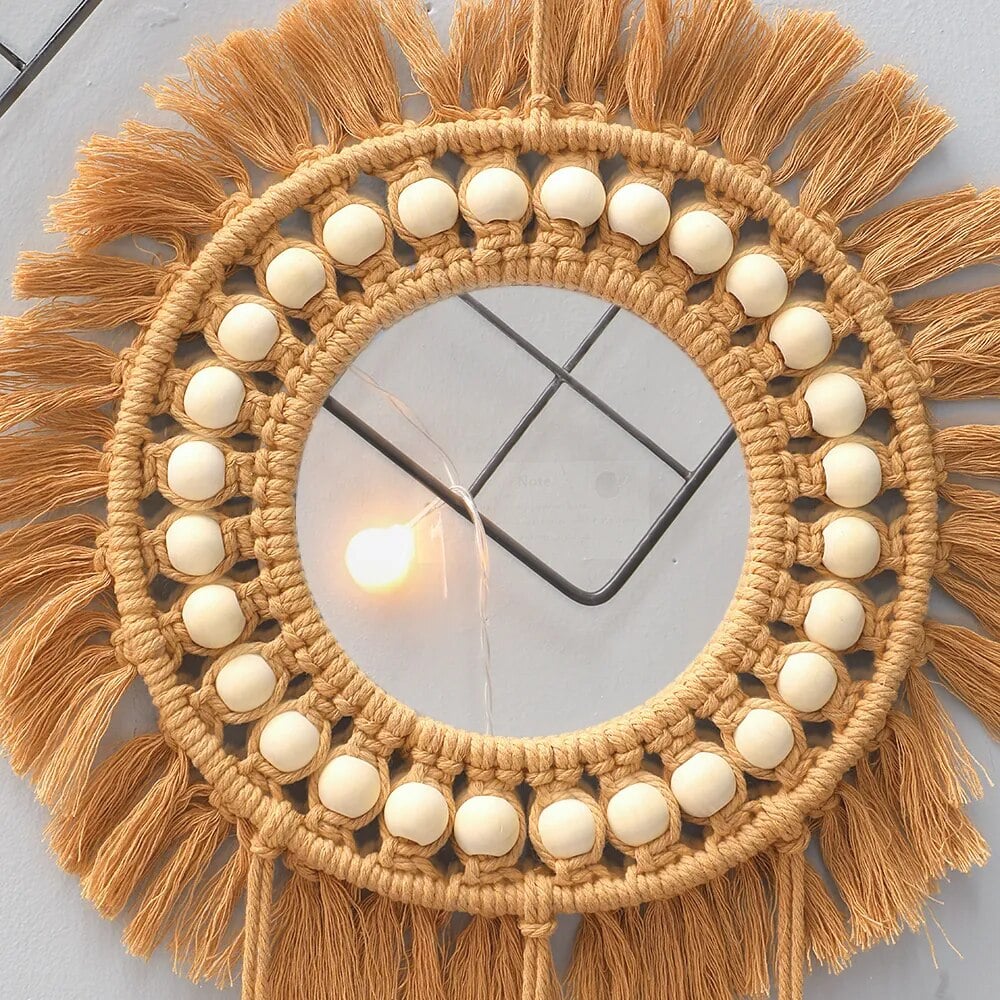 Round macrame mirror with bead ring and woven leaves
