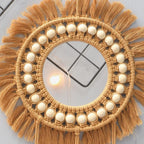 Round macrame mirror with bead ring and woven leaves