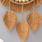 Round macrame mirror with bead ring and woven leaves