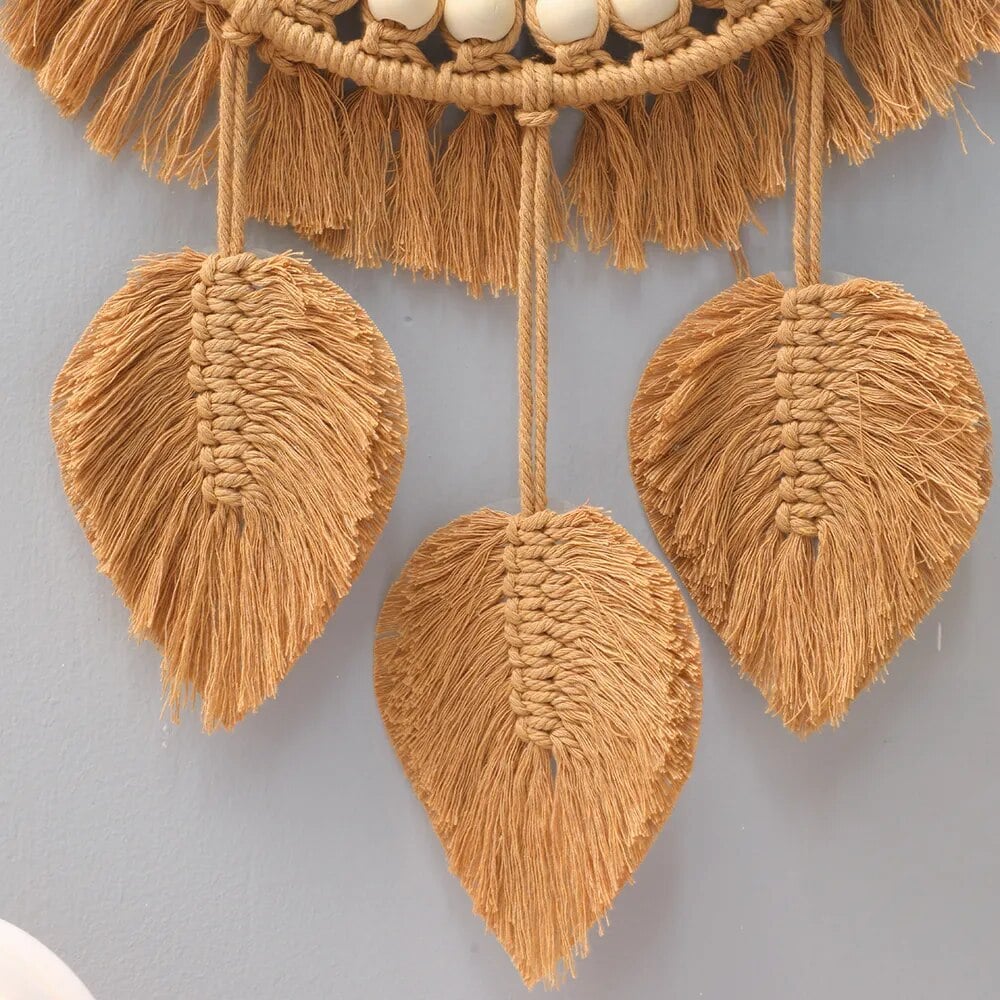 Round macrame mirror with bead ring and woven leaves