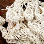 Cotton macrame hanging plant baskets with air plants