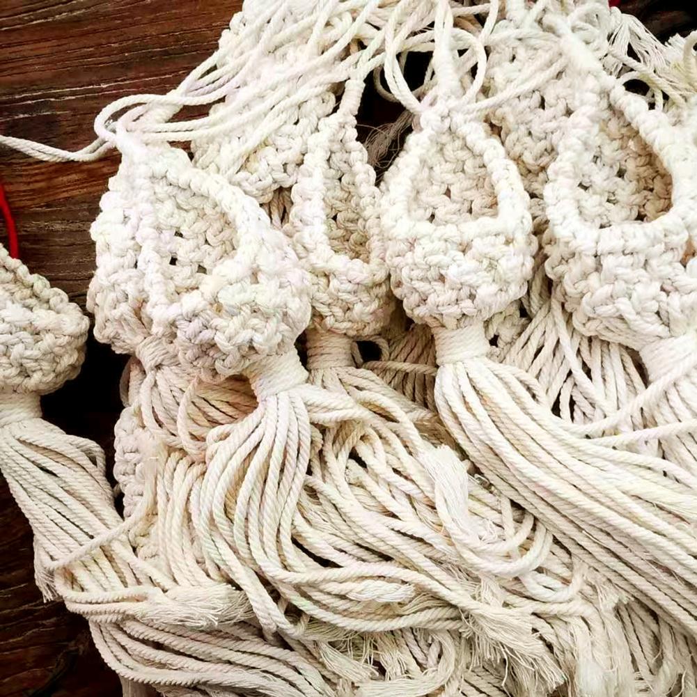 Cotton macrame hanging plant baskets with air plants