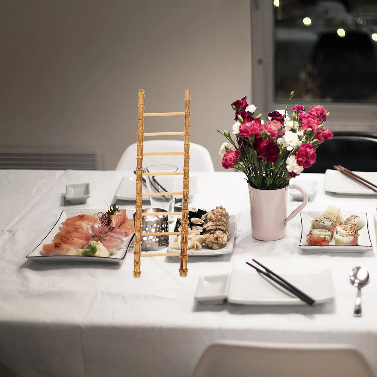 Small decorative bamboo ladder with hand tied rungs