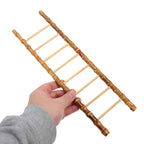 Small decorative bamboo ladder with hand tied rungs