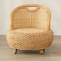 Mini low rattan armchair with rounded arms in natural beige