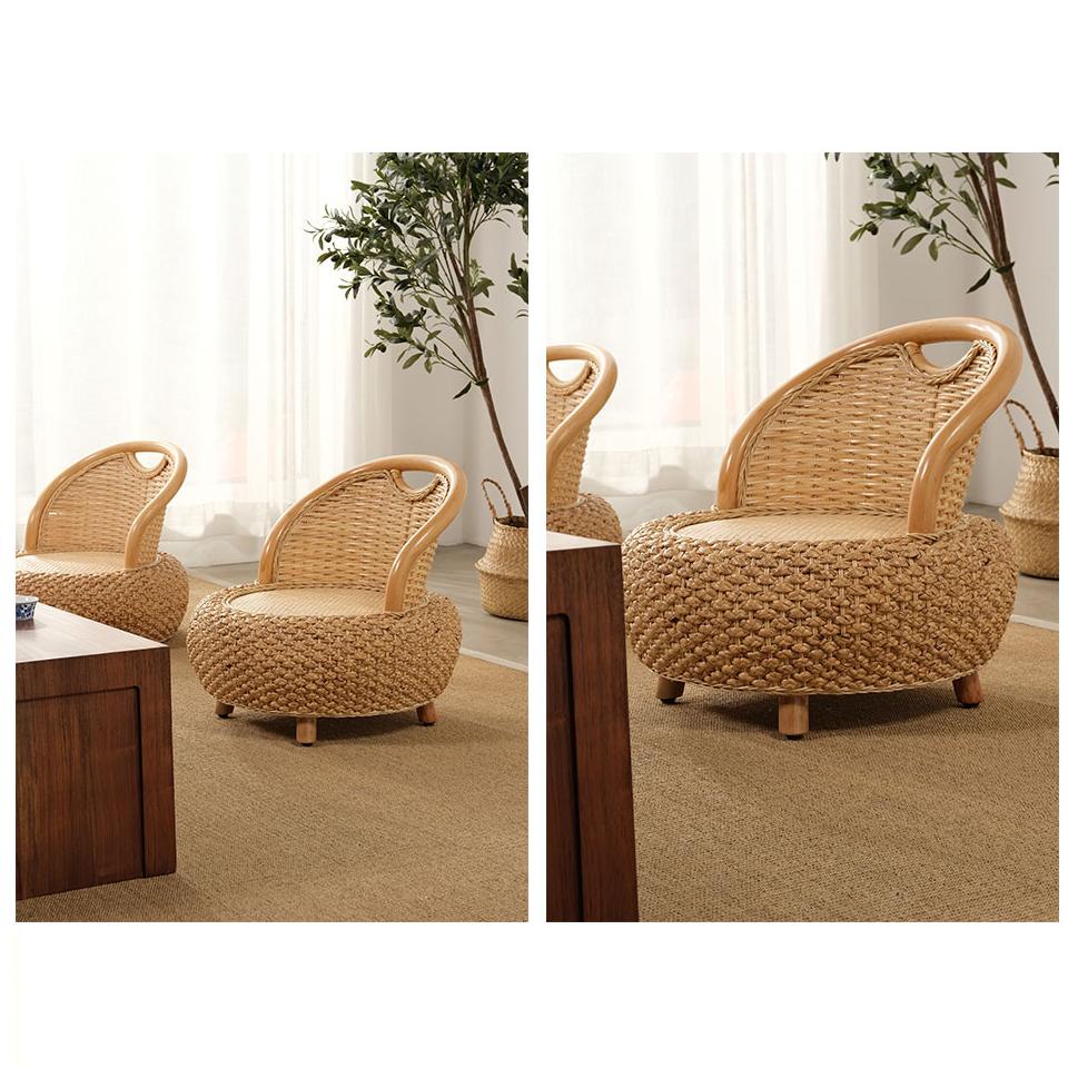 Mini low rattan armchair with rounded arms in natural beige