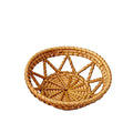 Small round openwork rattan basket with sunburst weave