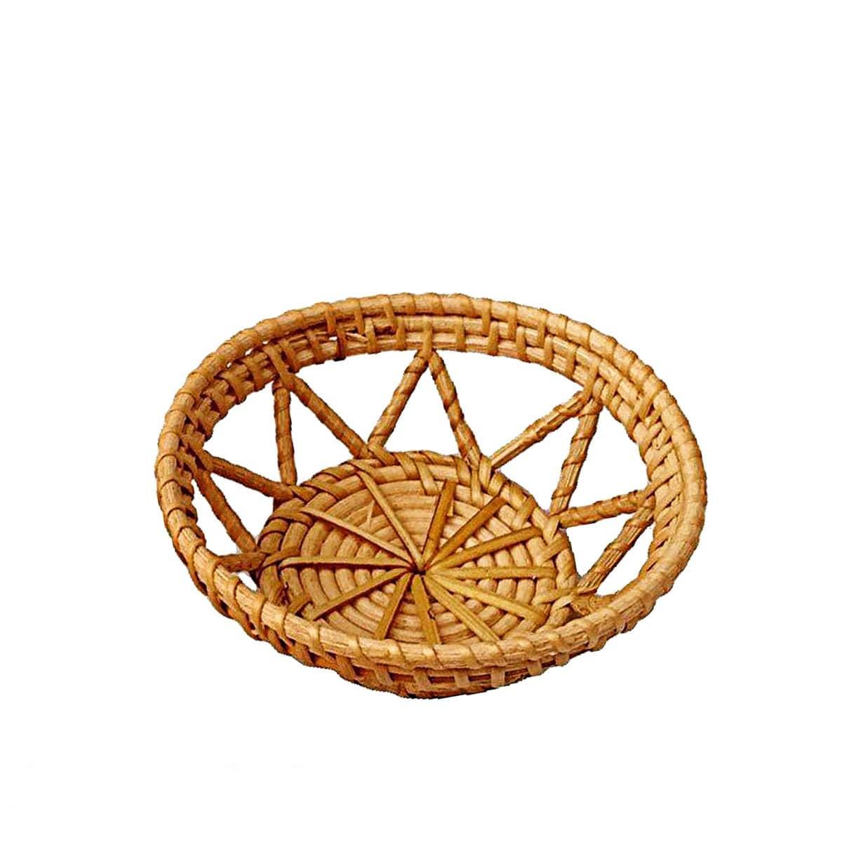 Small round openwork rattan basket with sunburst weave