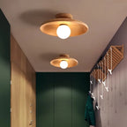 Minimalist Nordic ceiling light with a light natural wood ring