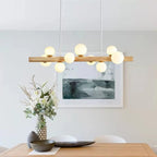 Minimalist pendant light with concentric natural wood rings