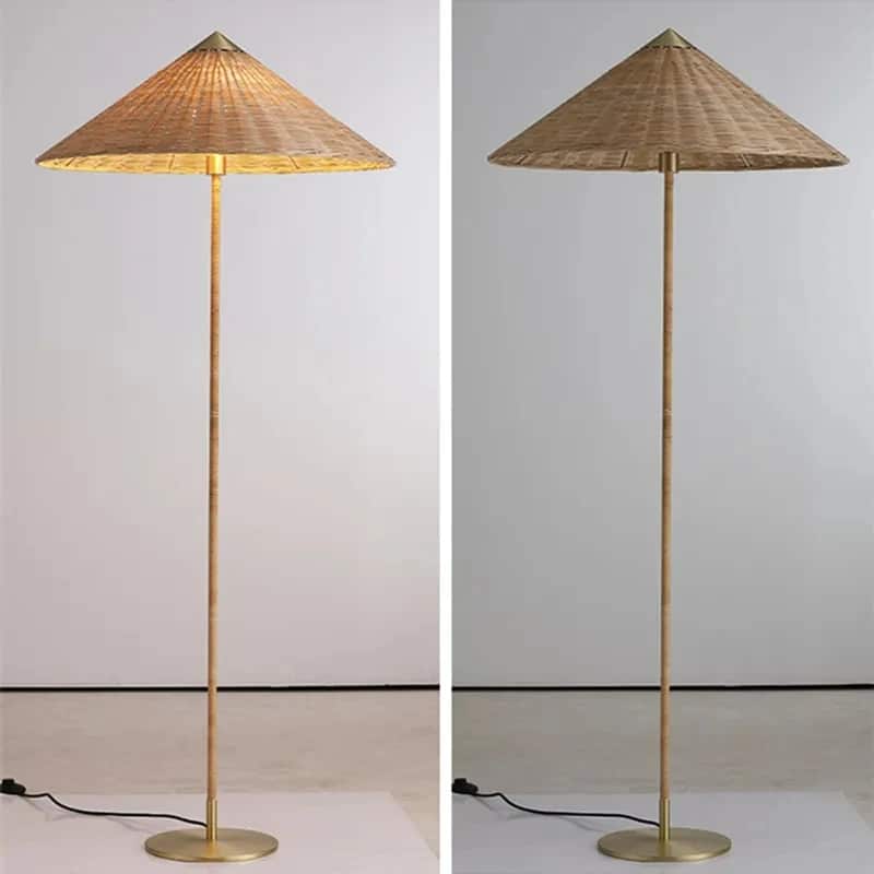 Tall minimalist floor lamp with a woven brown bamboo shade on an iron stand