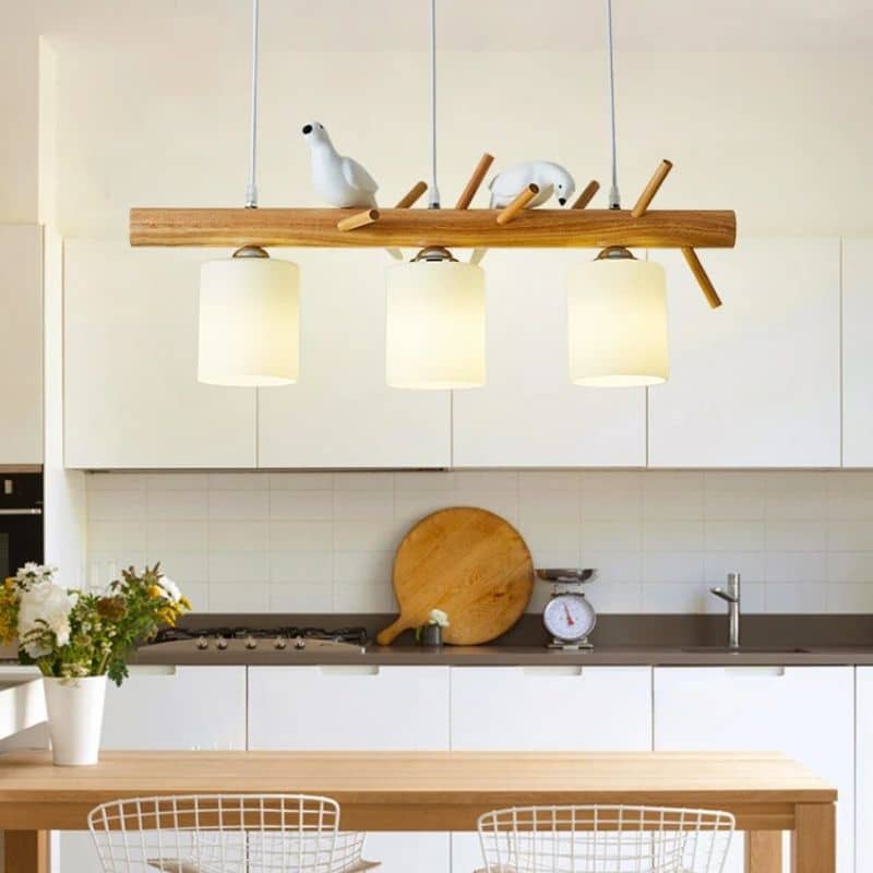 Modern geometric chandelier in brown wood and resin with cut out shapes