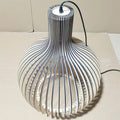 Modern geometric chandelier with light wood slats on a slim black metal frame