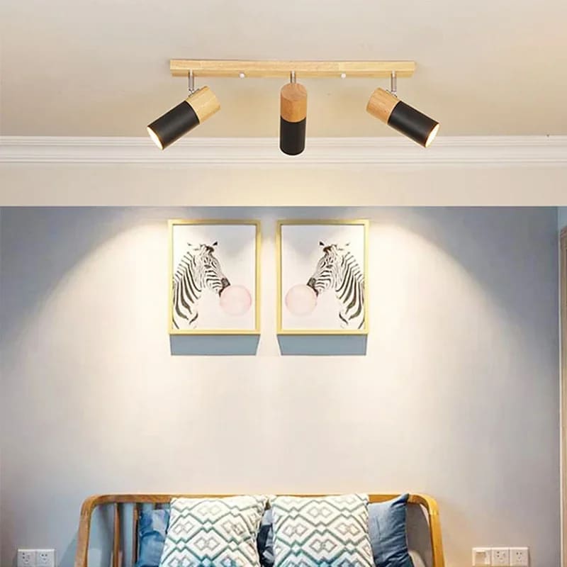 Modern ceiling light with three adjustable heads in wood and black metal