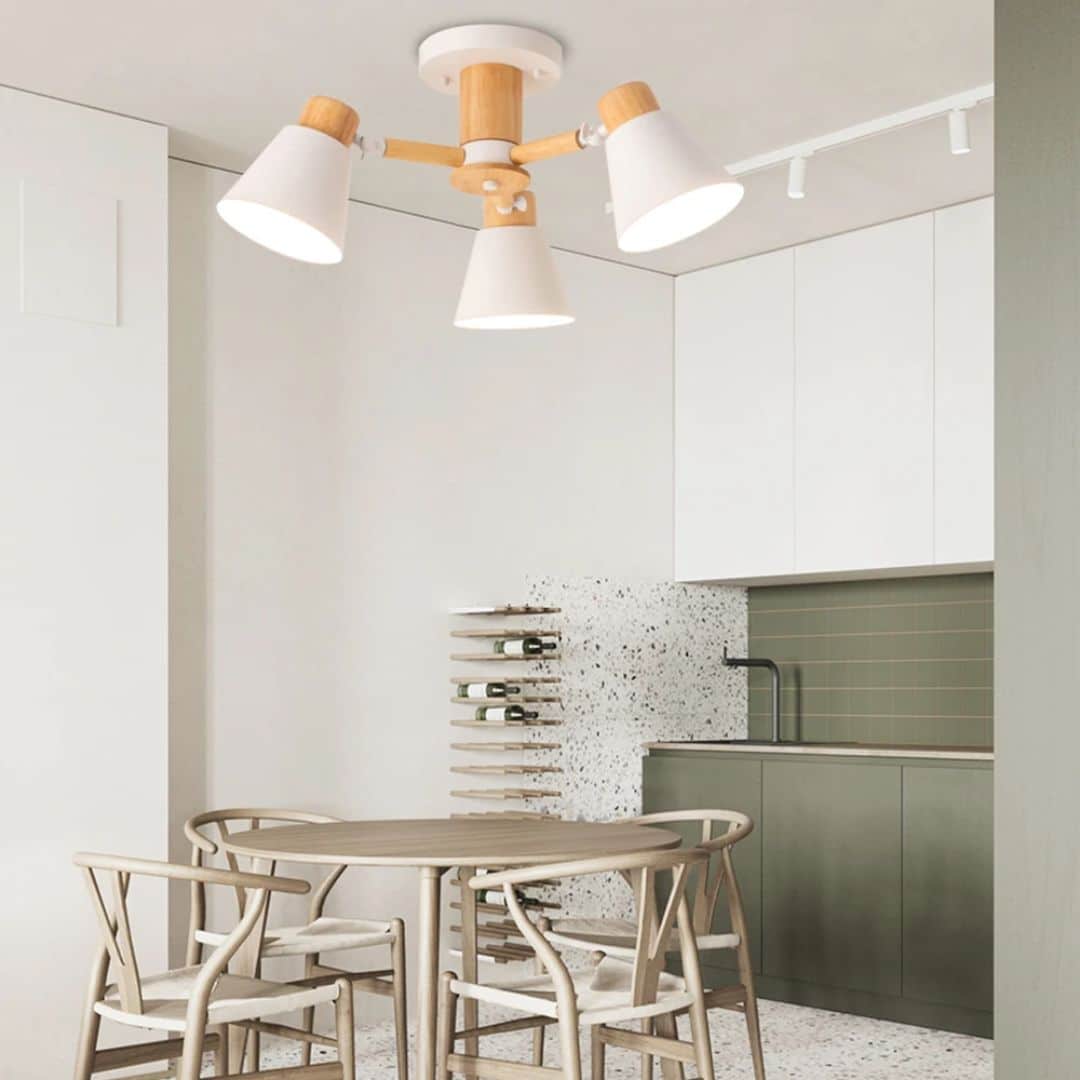 Modern three light chandelier with natural wood shades and a slim metal frame