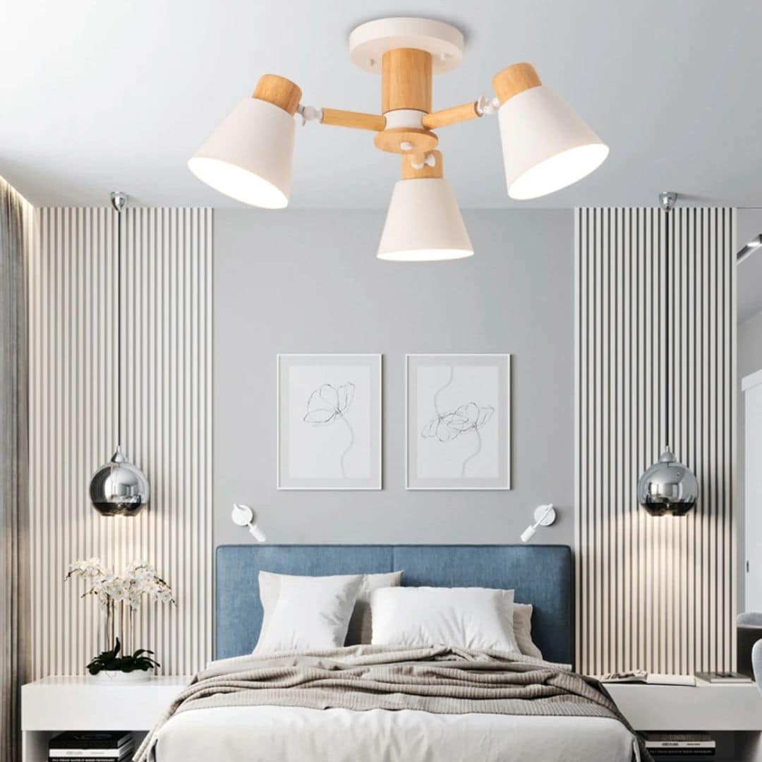 Modern three light chandelier with natural wood shades and a slim metal frame
