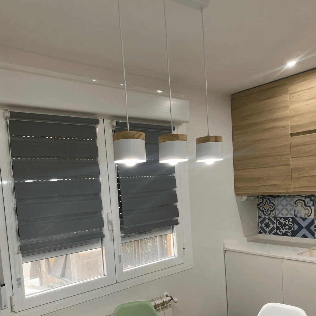 Slim modern pendant light pairing wood and brushed aluminum