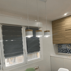 Slim modern pendant light pairing wood and brushed aluminum